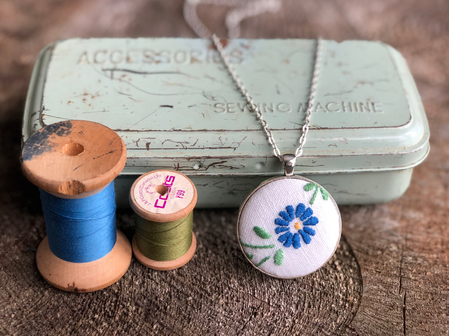 Blue flower embroidered pendant necklace