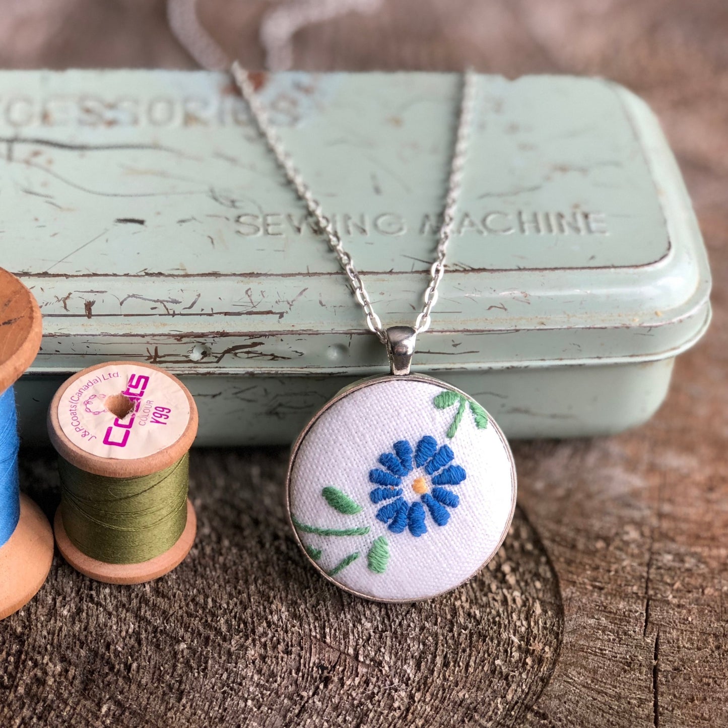 Blue flower embroidered pendant necklace