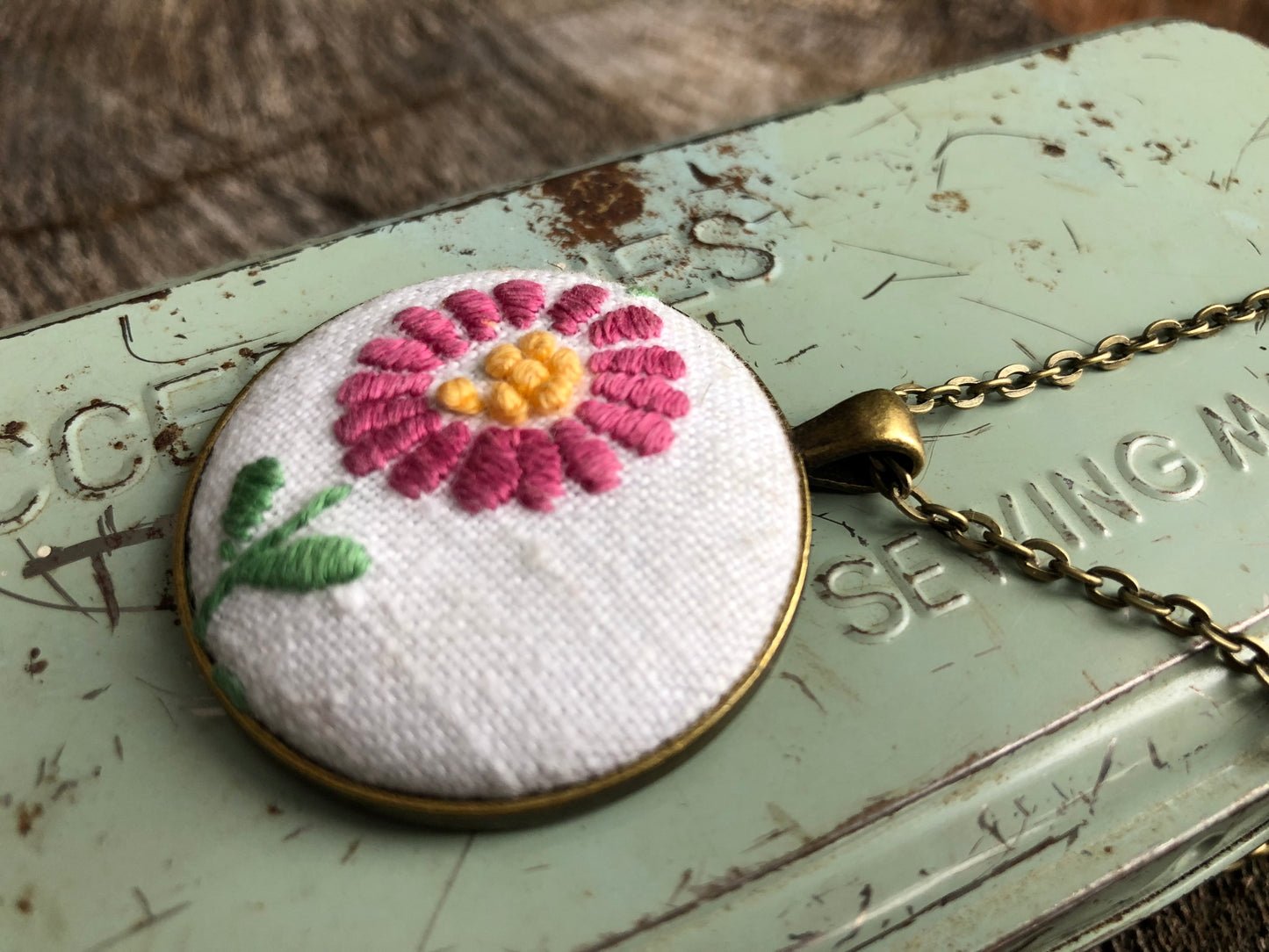 Pink flower embroidered pendant necklace