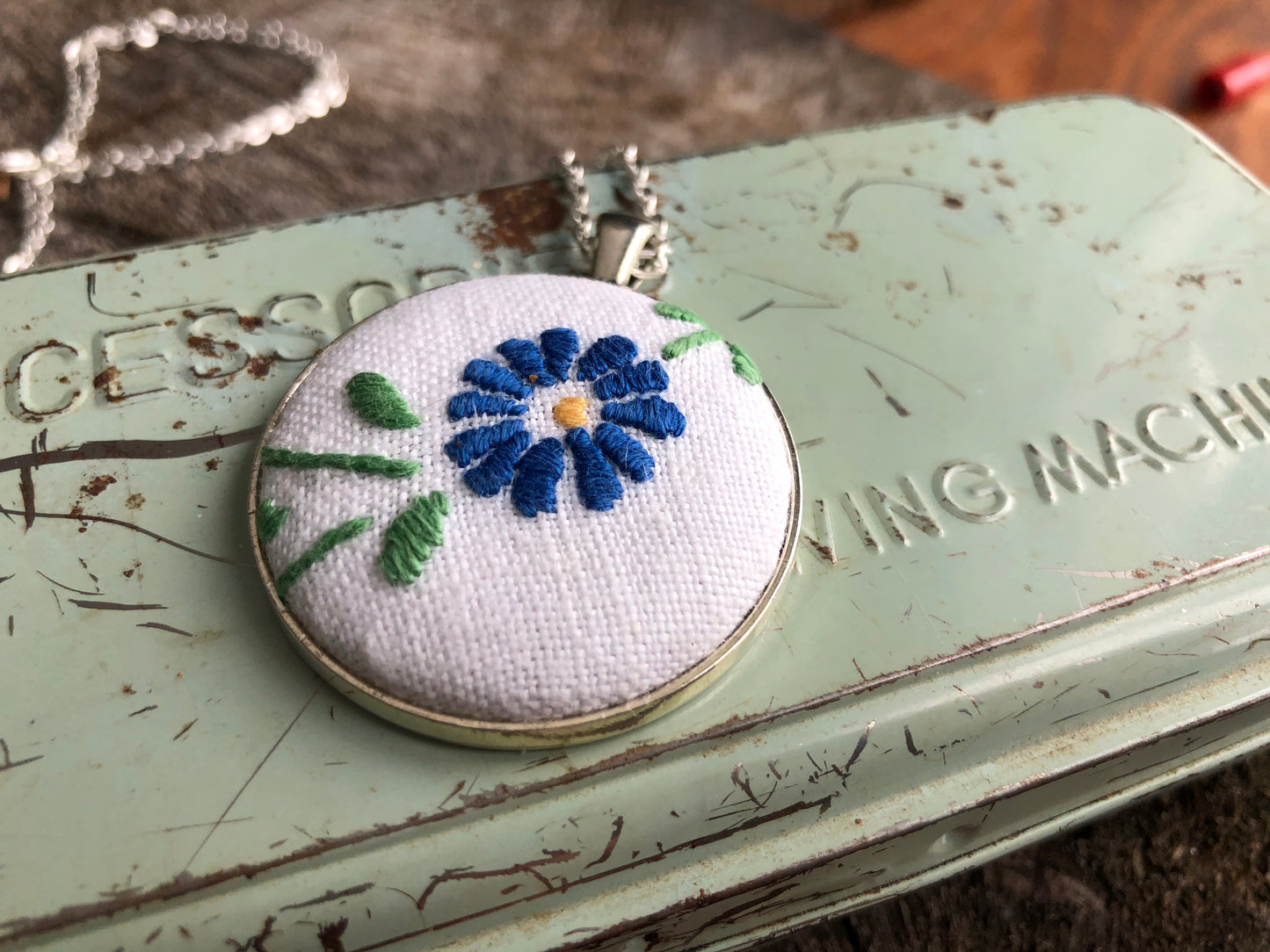 Blue flower embroidered pendant necklace